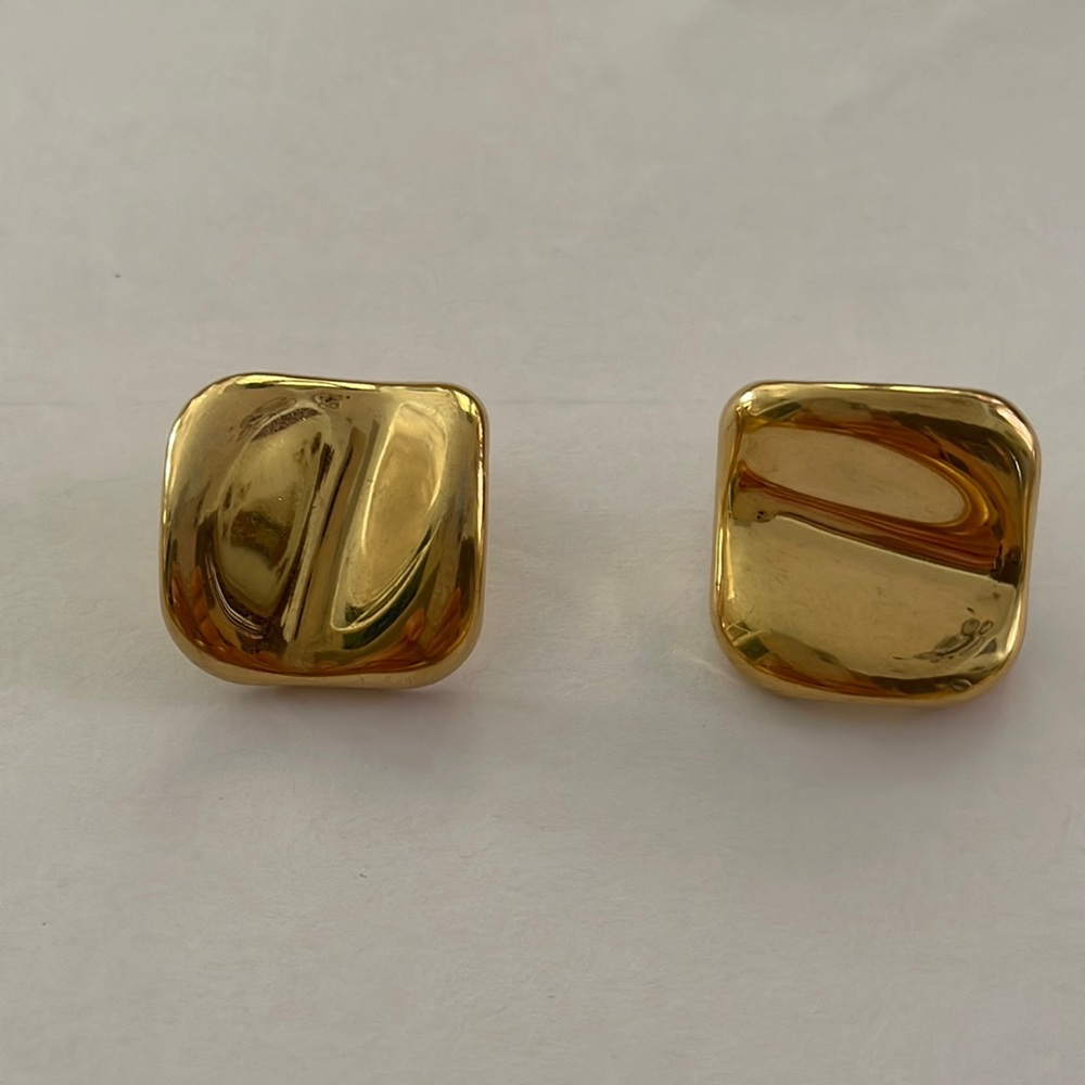 Gold tone pierced earrings